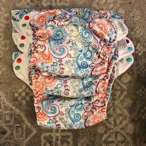 Set of 3 Bum Genius reusable cloth diapers and pads